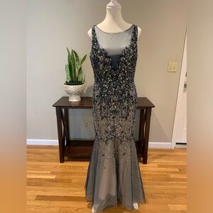 Evening dress navy blue with nude underlay. Gorgeous beading
